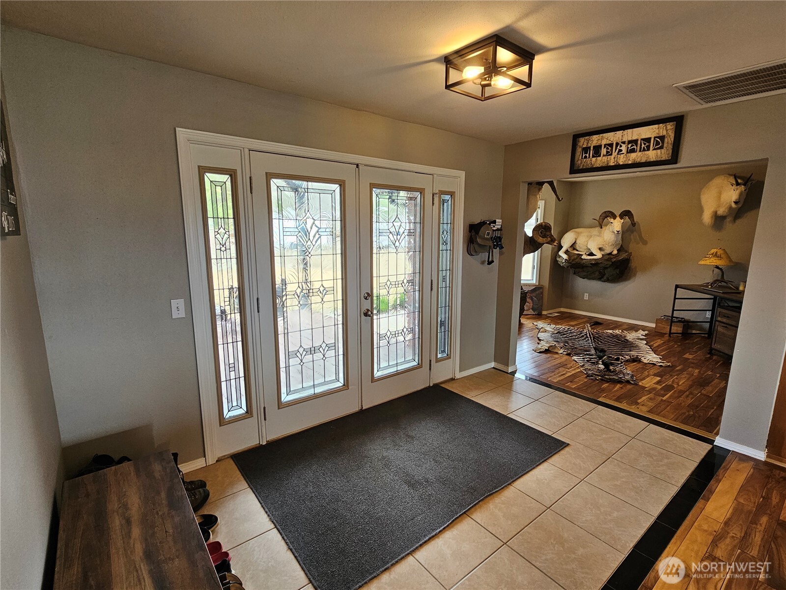 711 Havillah Road Tonasket, WA 98855 - Photo 7 of 40 a view of a living room with hardwood floor