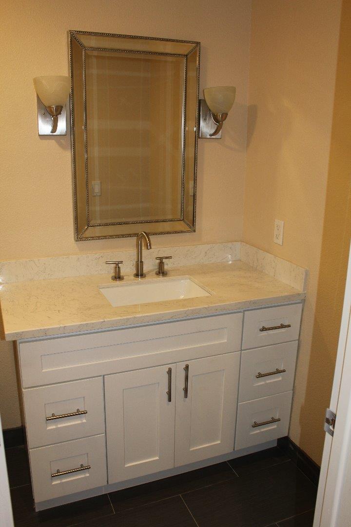 250 Loma Road San Carlos, CA 94070 - Photo 22 of 25 a bathroom with a sink and a mirror