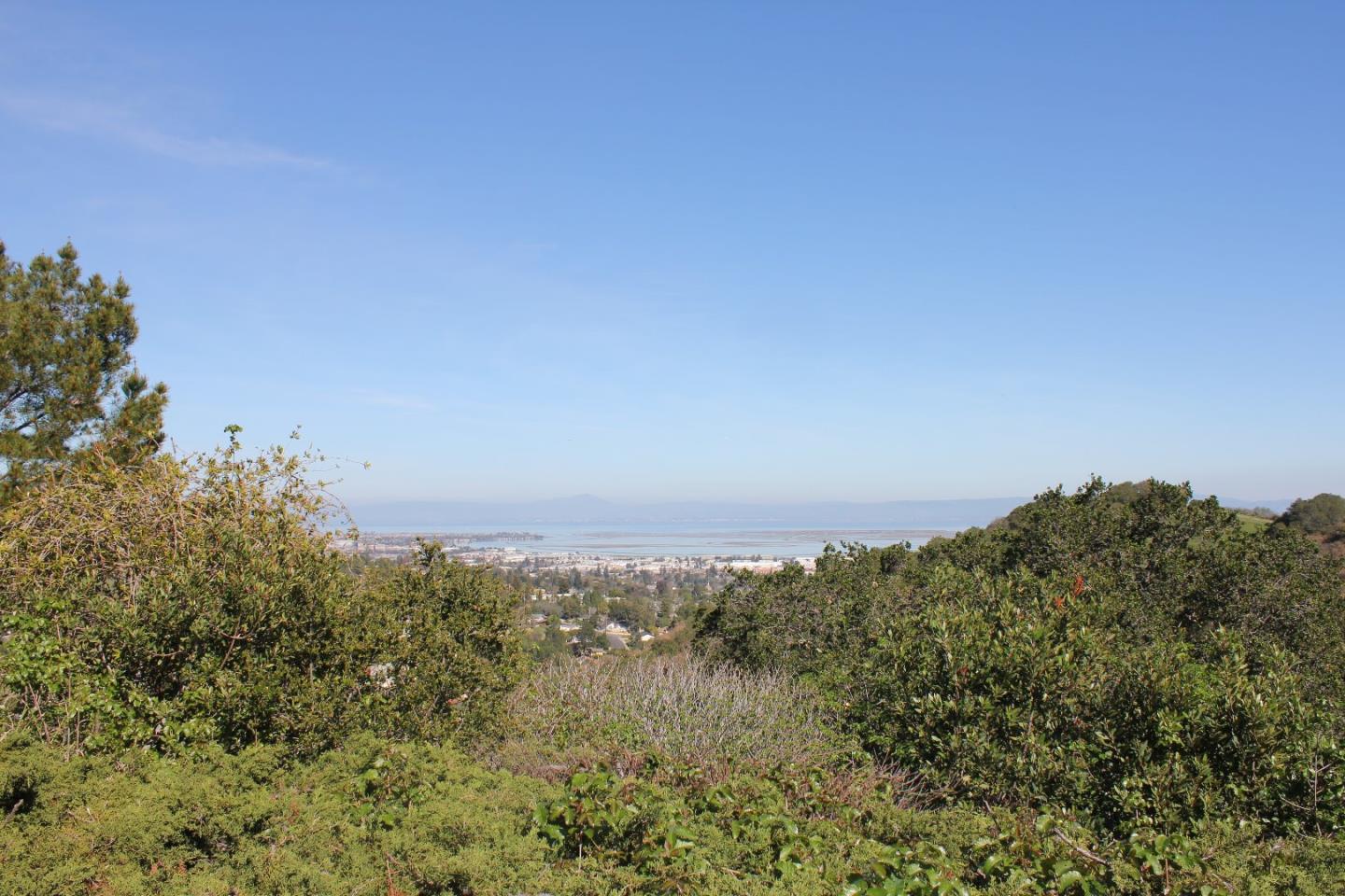 250 Loma Road San Carlos, CA 94070 - Photo 25 of 25 a view of a large building with a mountain in the background