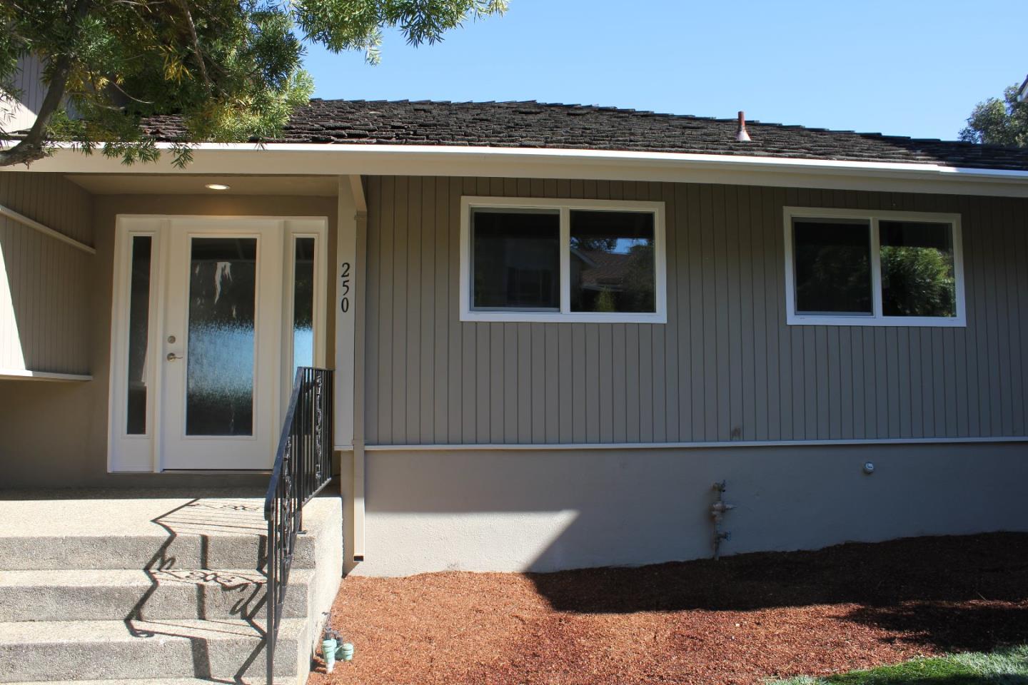 250 Loma Road San Carlos, CA 94070 - Photo 3 of 25 a view of a house with a balcony