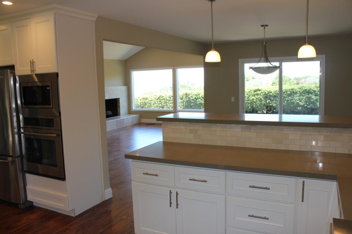 250 Loma Road San Carlos, CA 94070 - Photo 8 of 25 a kitchen with a refrigerator and window