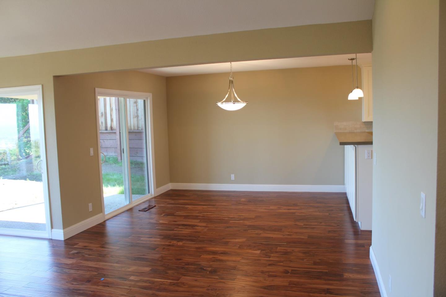 250 Loma Road San Carlos, CA 94070 - Photo 10 of 25 a view of an empty room with wooden floor and a window