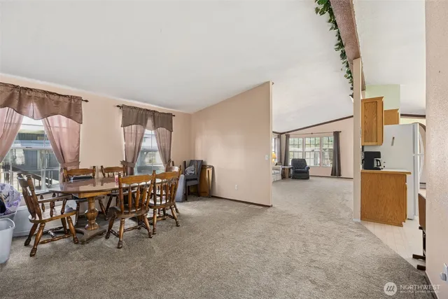 a view of a livingroom with furniture and window