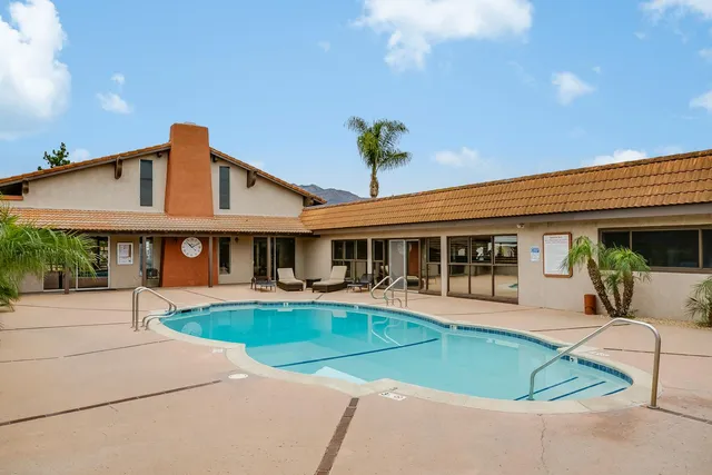 a view of a living room and bathroom