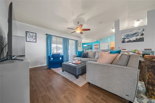 a living room with furniture and window
