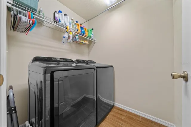 a utility room with dryer and washer