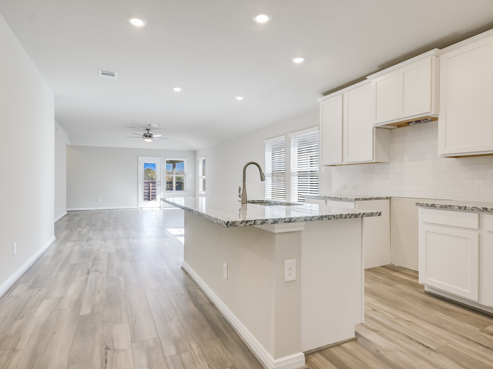 13306 Rindle Reach Drive Buda, TX 78610 - Photo 3 of 12 Photo is not of the actual home, but is an inspirational photo of builder’s model home and may depict options, furnishings, and/or decorator features that are not included