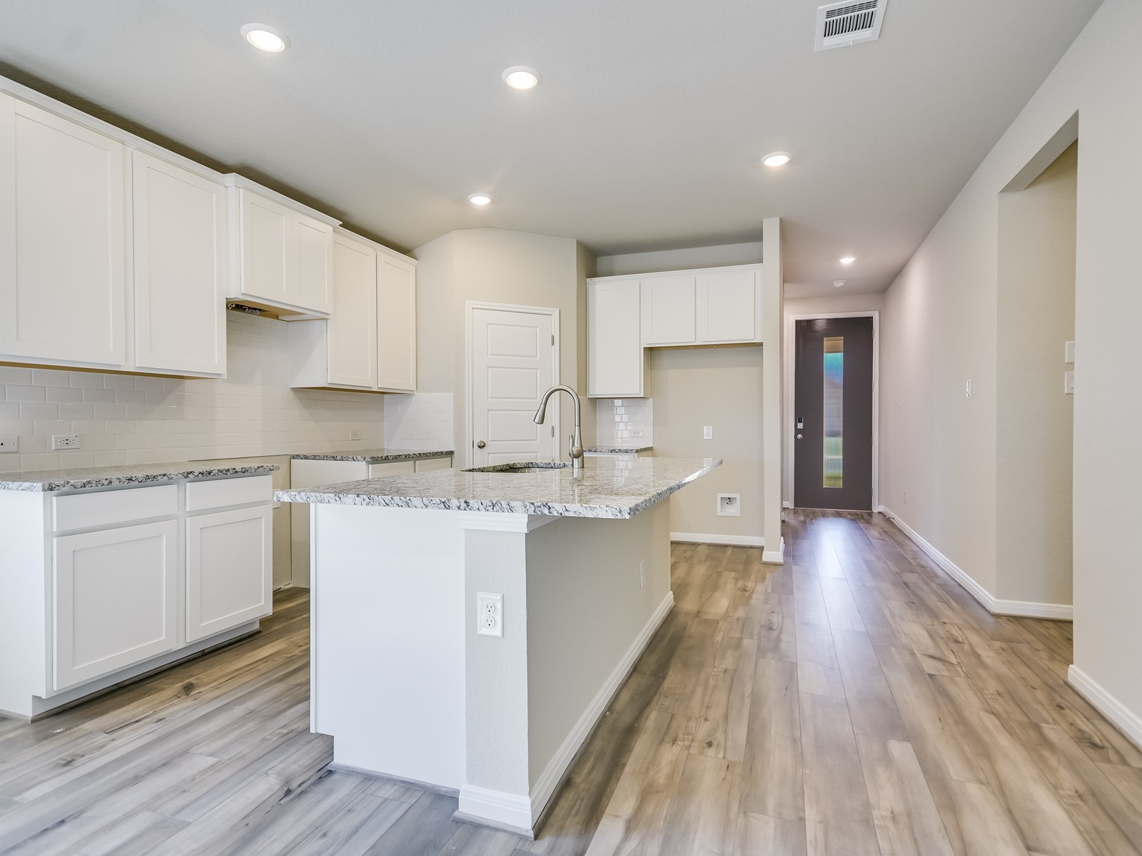 13306 Rindle Reach Drive Buda, TX 78610 - Photo 4 of 12 Photo is not of the actual home, but is an inspirational photo of builder’s model home and may depict options, furnishings, and/or decorator features that are not included