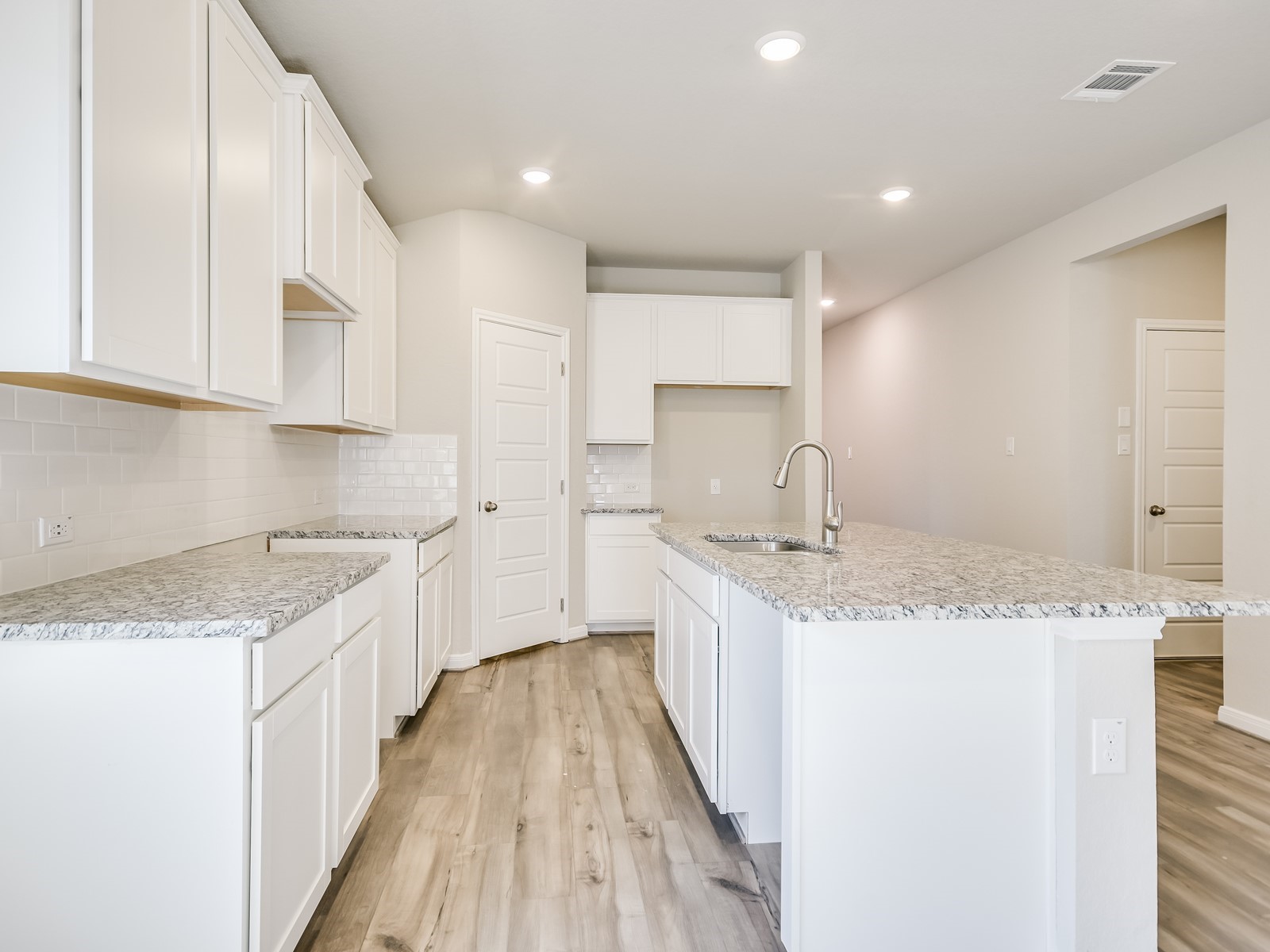 13306 Rindle Reach Drive Buda, TX 78610 - Photo 6 of 12 Photo is not of the actual home, but is an inspirational photo of builder’s model home and may depict options, furnishings, and/or decorator features that are not included