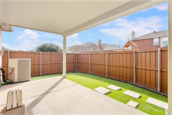 a view of a backyard with a garden