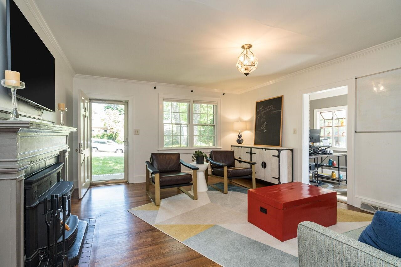 1621 Lorraine Road Raleigh, NC 27607 - Photo 12 of 28 Living room is also sun-filled!
