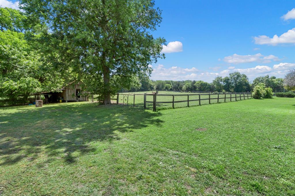 3231 Plainview Road Midlothian, TX 76065 - Photo 3 of 22 a view of a park with large trees