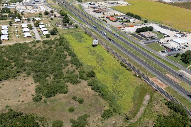 a view of swimming pool from a balcony
