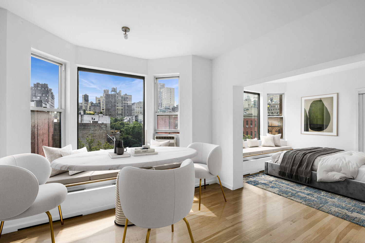 104 West 70th Street, Unit 5F Manhattan, NY 10023 - Photo 3 of 10 a living room with furniture and a large window