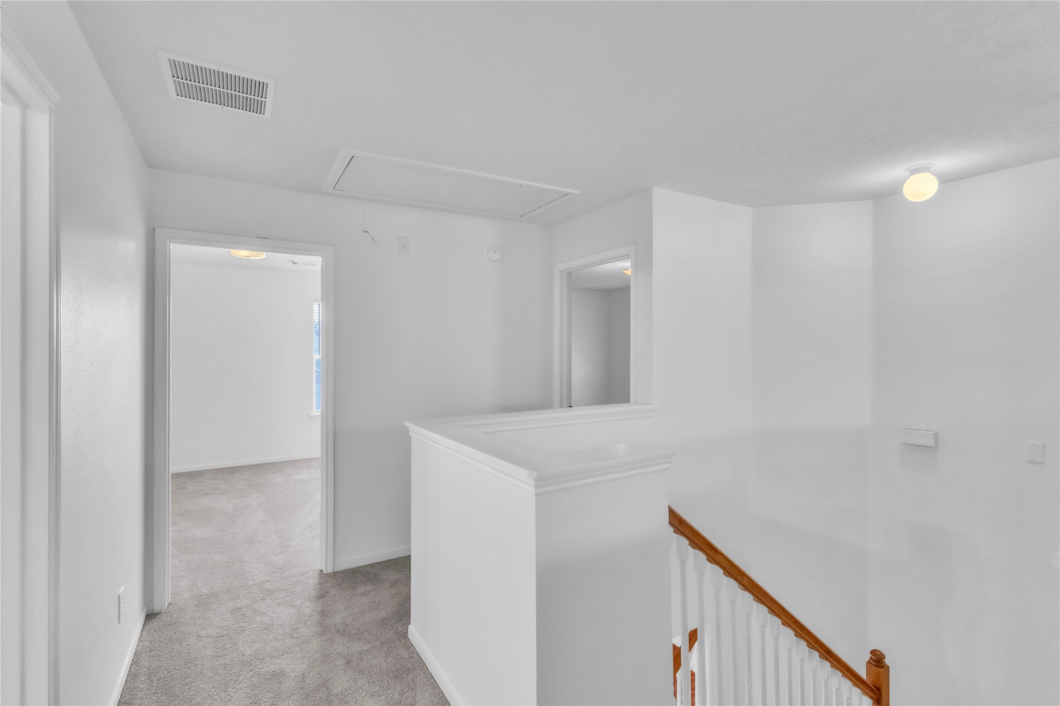 18027 Oak Orchard Lane Cypress, TX 77433 - Photo 23 of 37 a view of a hallway to an empty room