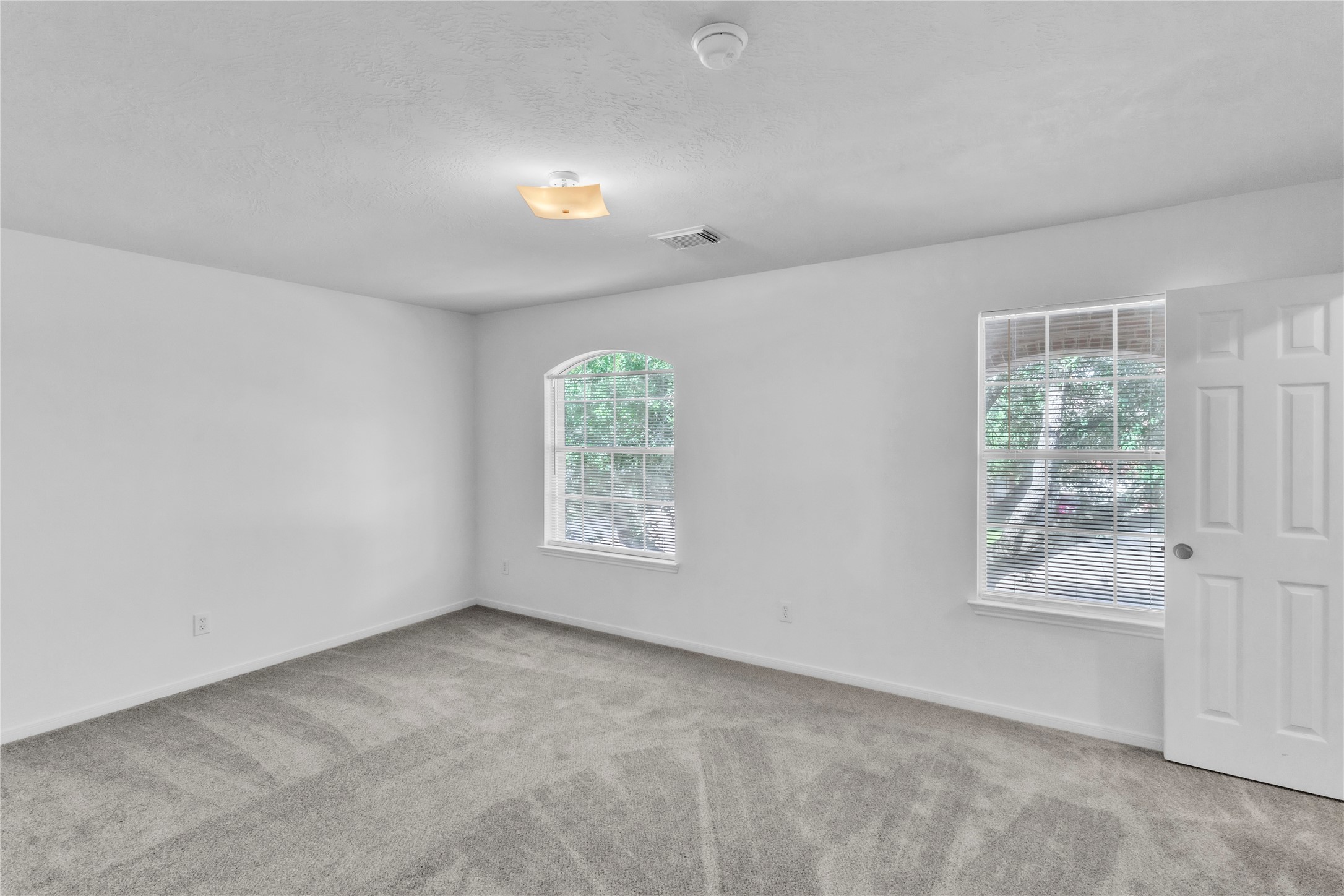 18027 Oak Orchard Lane Cypress, TX 77433 - Photo 25 of 37 an empty room with windows