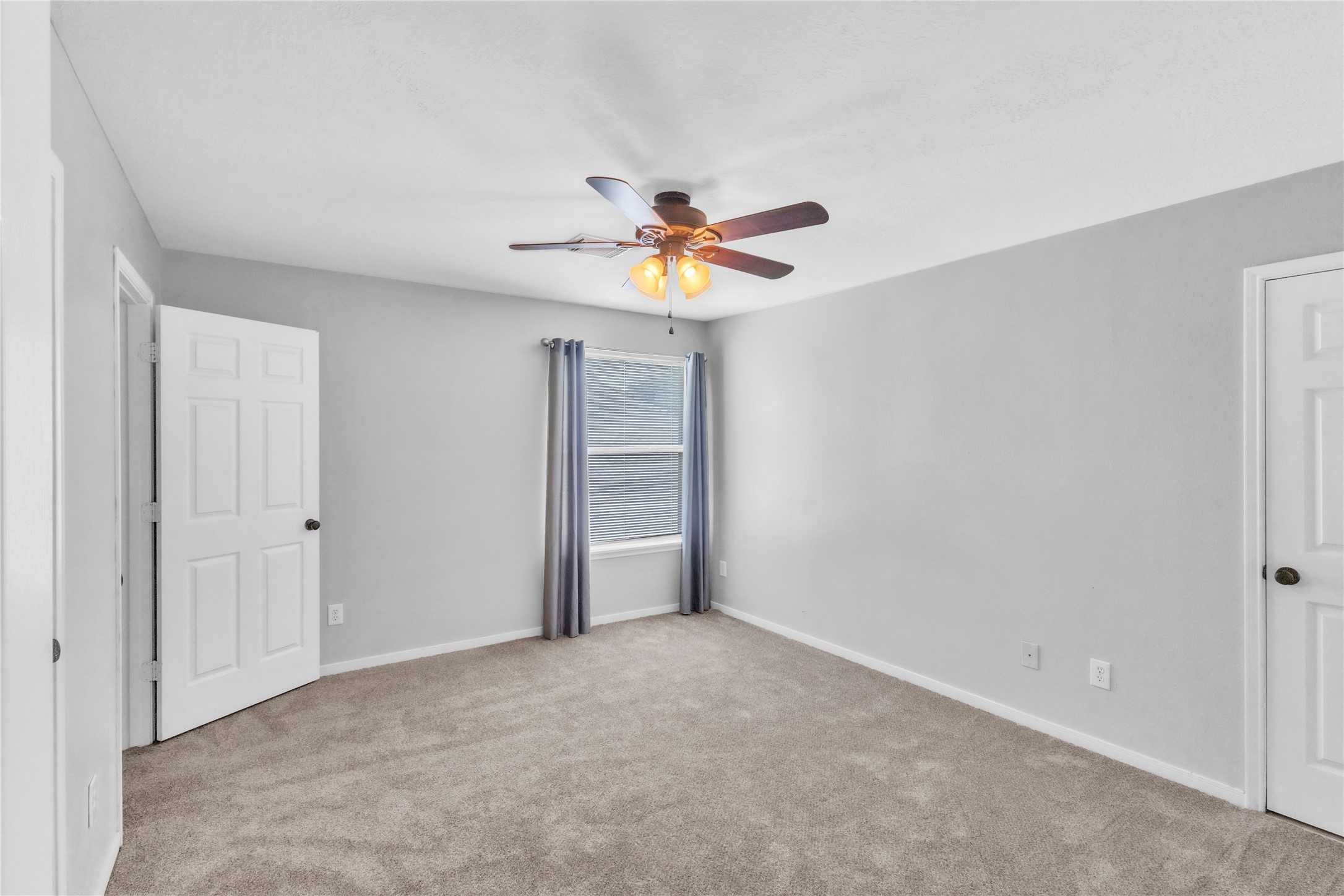 18027 Oak Orchard Lane Cypress, TX 77433 - Photo 31 of 37 a view of an empty room with a window