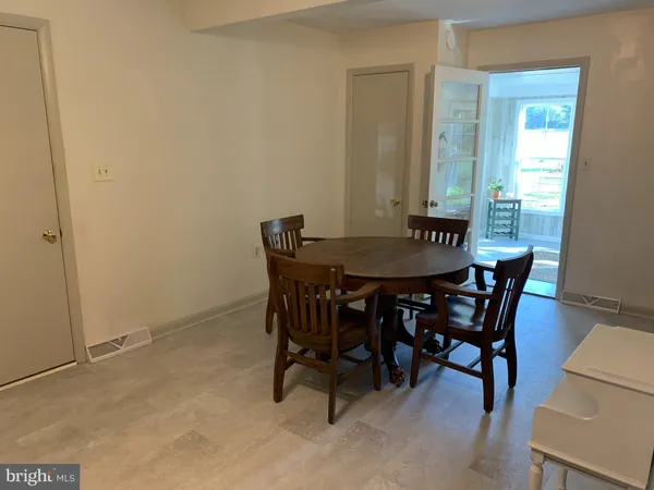 a kitchen with stainless steel appliances granite countertop a refrigerator stove a sink and dishwasher