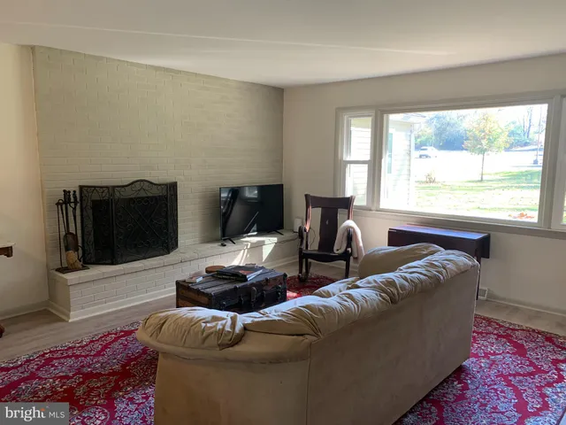 a bathroom with a toilet and shower