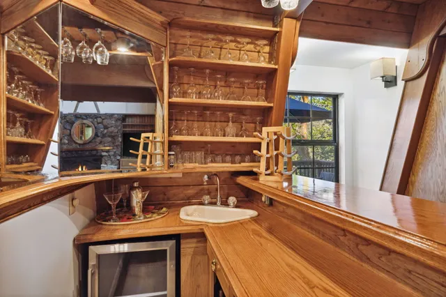 a view of balcony with outdoor seating and wooden floor