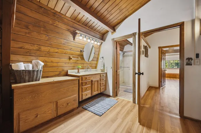 a view of balcony with wooden floor