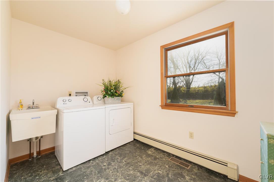 1597 Orchards Road Hellertown, PA 18055 - Photo 8 of 19 a utility room with dryer and washer