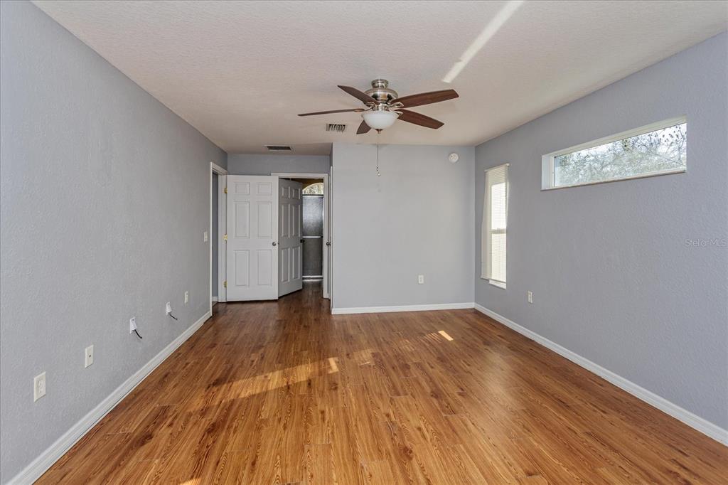 119 Spruce Road Ocala, FL 34472 - Photo 12 of 23 a view of an empty room with a window
