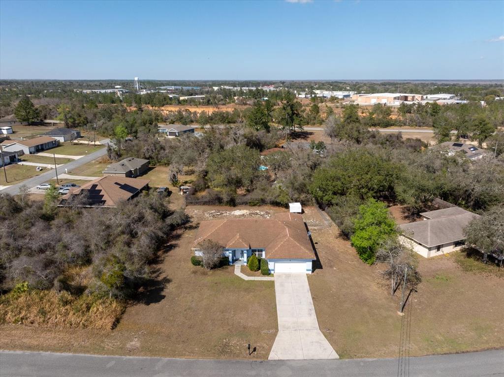 119 Spruce Road Ocala, FL 34472 - Photo 2 of 23 an aerial view of residential houses with outdoor space and trees