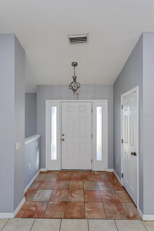 119 Spruce Road Ocala, FL 34472 - Photo 4 of 23 a view of an entryway of a house