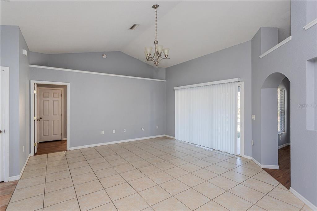 119 Spruce Road Ocala, FL 34472 - Photo 6 of 23 a view of an empty room with window