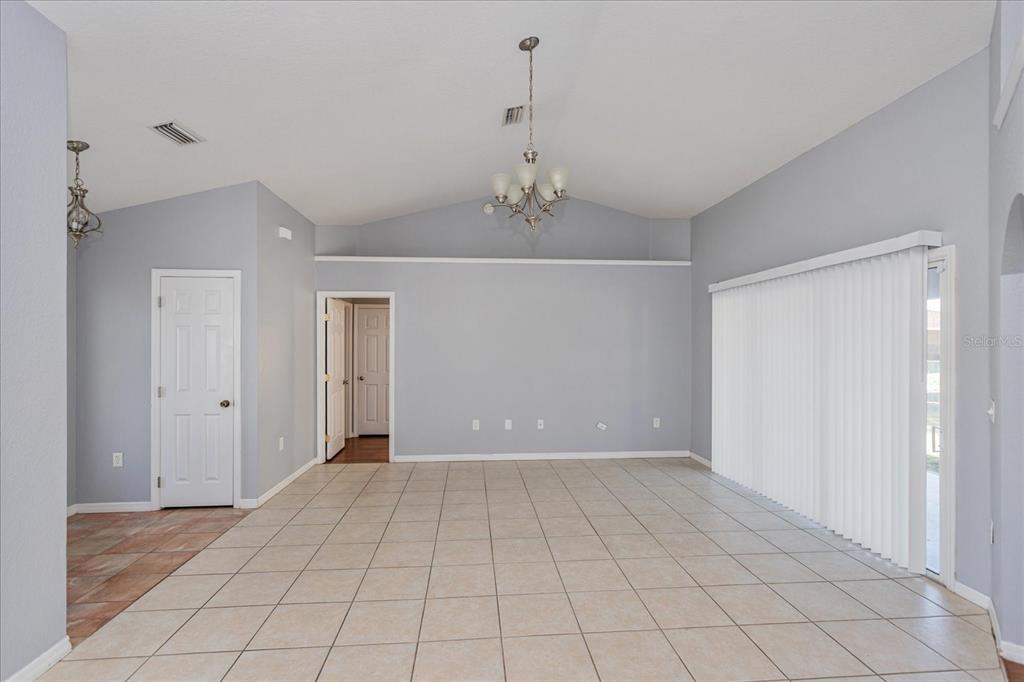 119 Spruce Road Ocala, FL 34472 - Photo 8 of 23 a view of an empty room with window
