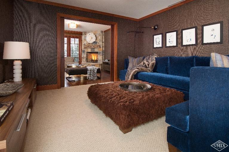 1 Vail Road, Unit 7203 Vail, CO 81657 - Photo 8 of 16 a bedroom with a bed couch and window