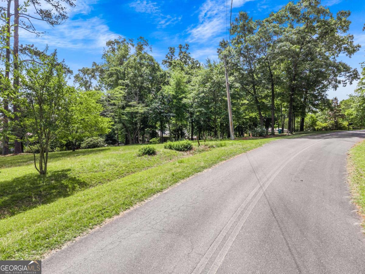 151 Bill Johnson Road Northeast Milledgeville, GA 31061 - Photo 8 of 27 a view of a park with large trees