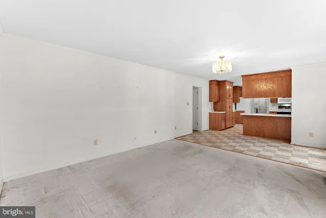 a view of empty room with a flat screen tv