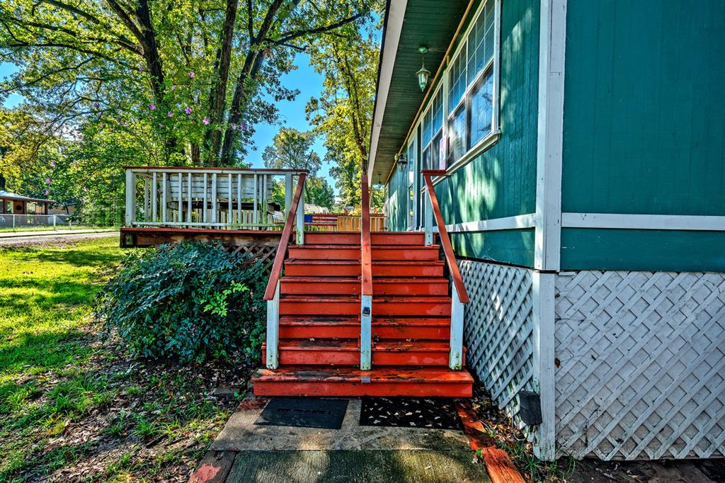 241 Robin Hood Road Gordonville, TX 76245 - Photo 31 of 40 a front view of a house with a yard