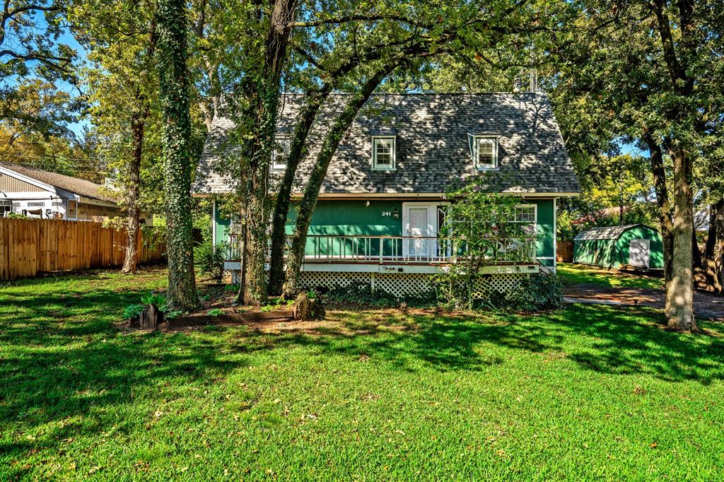 241 Robin Hood Road Gordonville, TX 76245 - Photo 33 of 40 a view of a house with backyard and sitting area