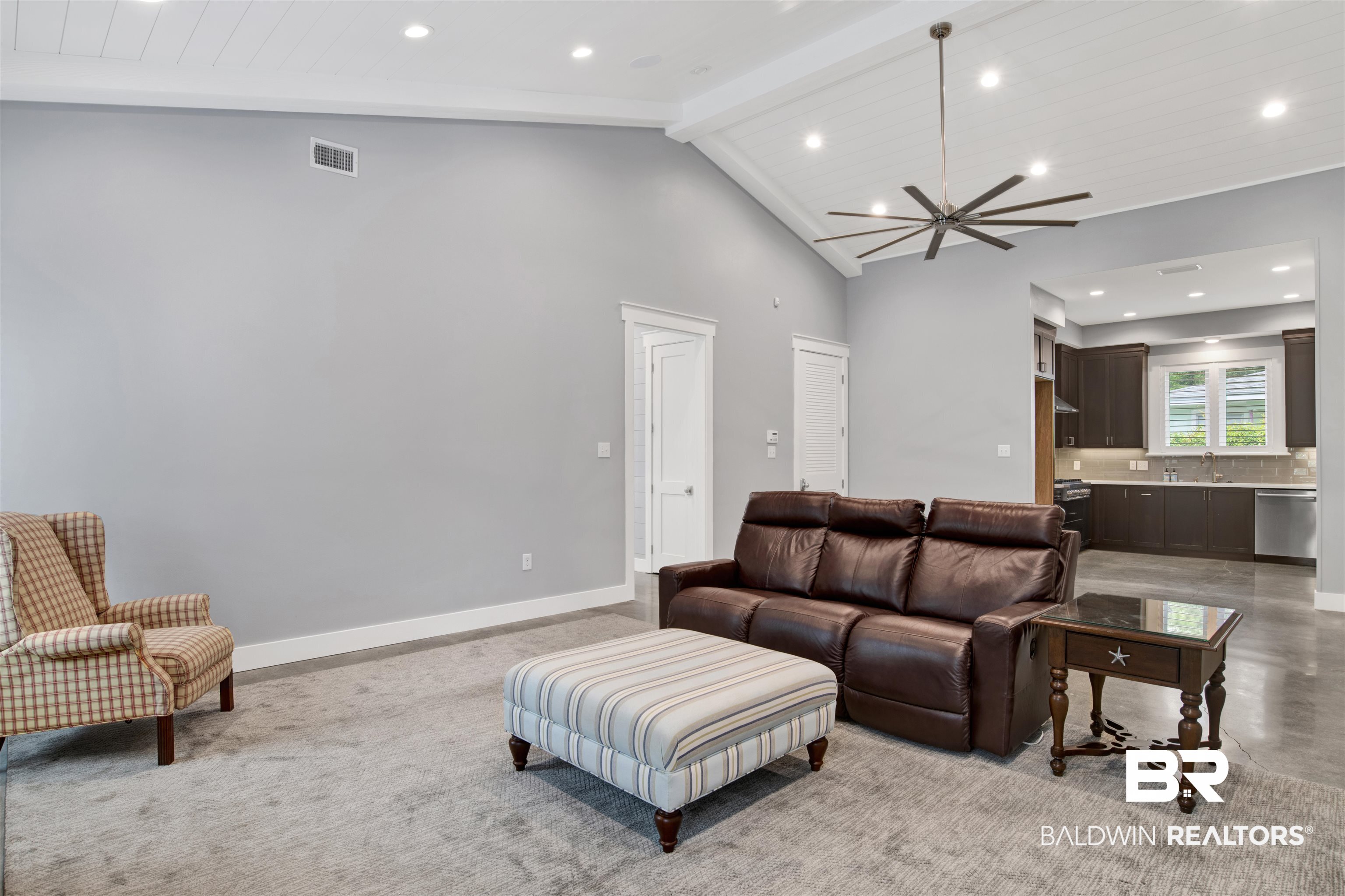 27980 Canal Road Orange Beach, AL 36561 - Photo 20 of 46 Living area featuring recessed lighting, high vaulted ceiling, and a wood ceiling with exposed beams