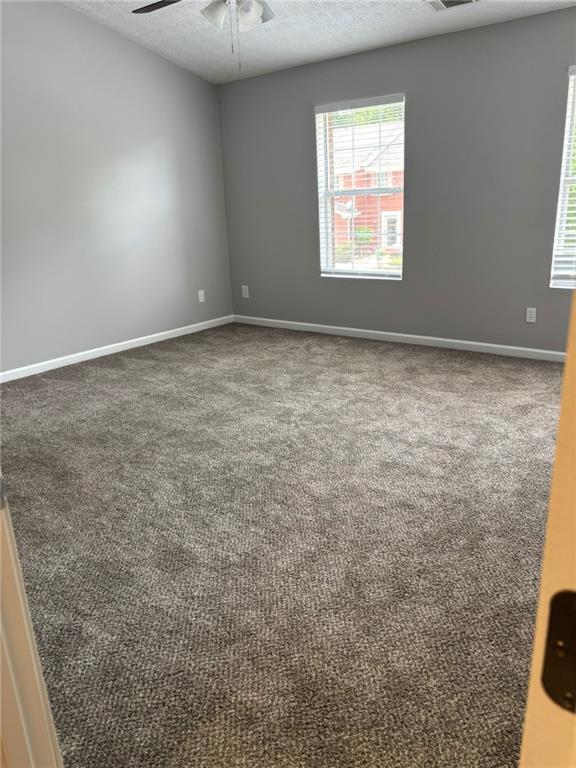 5739 Windfall Lane Lithonia, GA 30058 - Photo 27 of 36 an empty room with a window