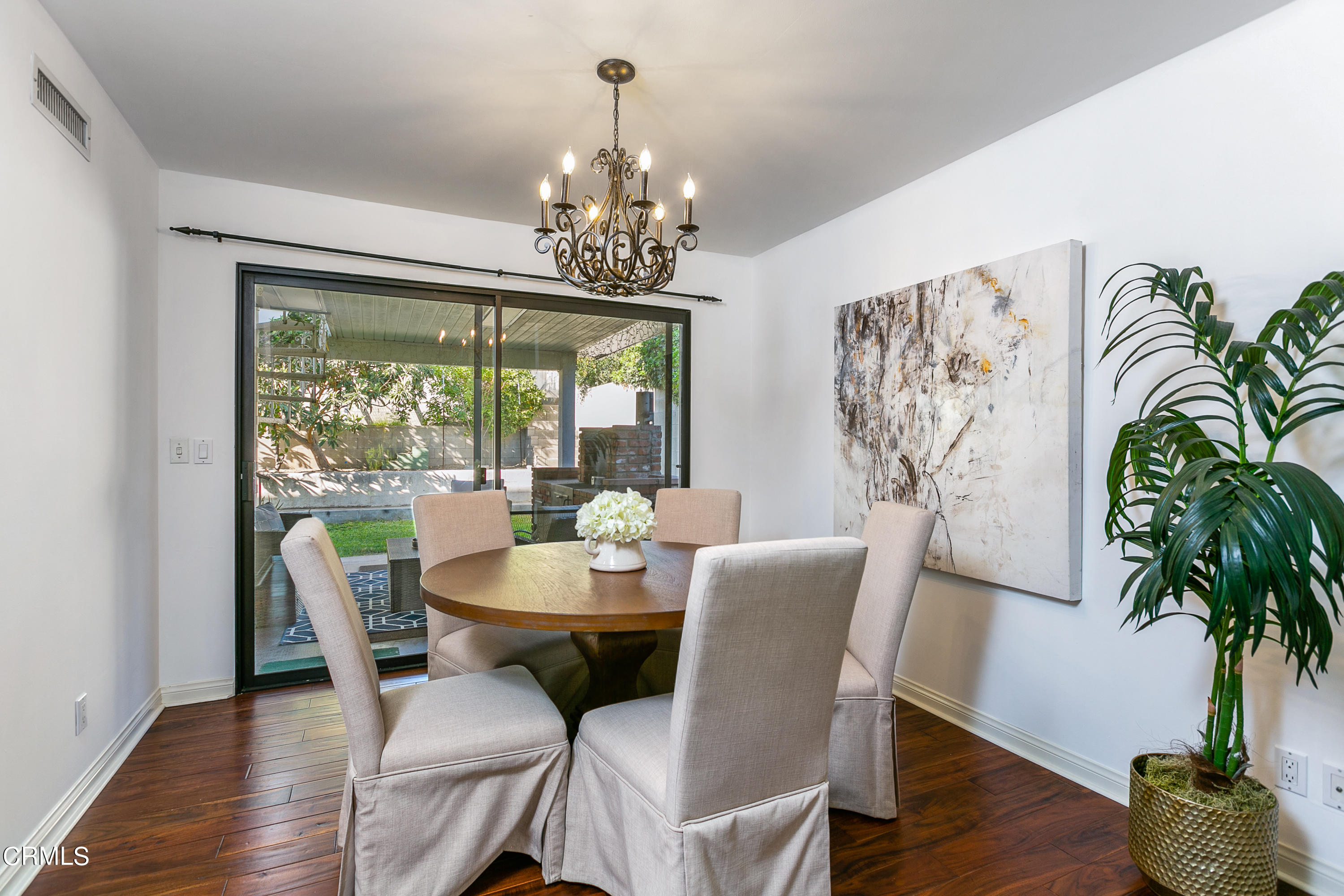 3431 Brookridge Road Duarte, CA 91010 - Photo 5 of 26 a dining room with furniture potted plants and wooden floor