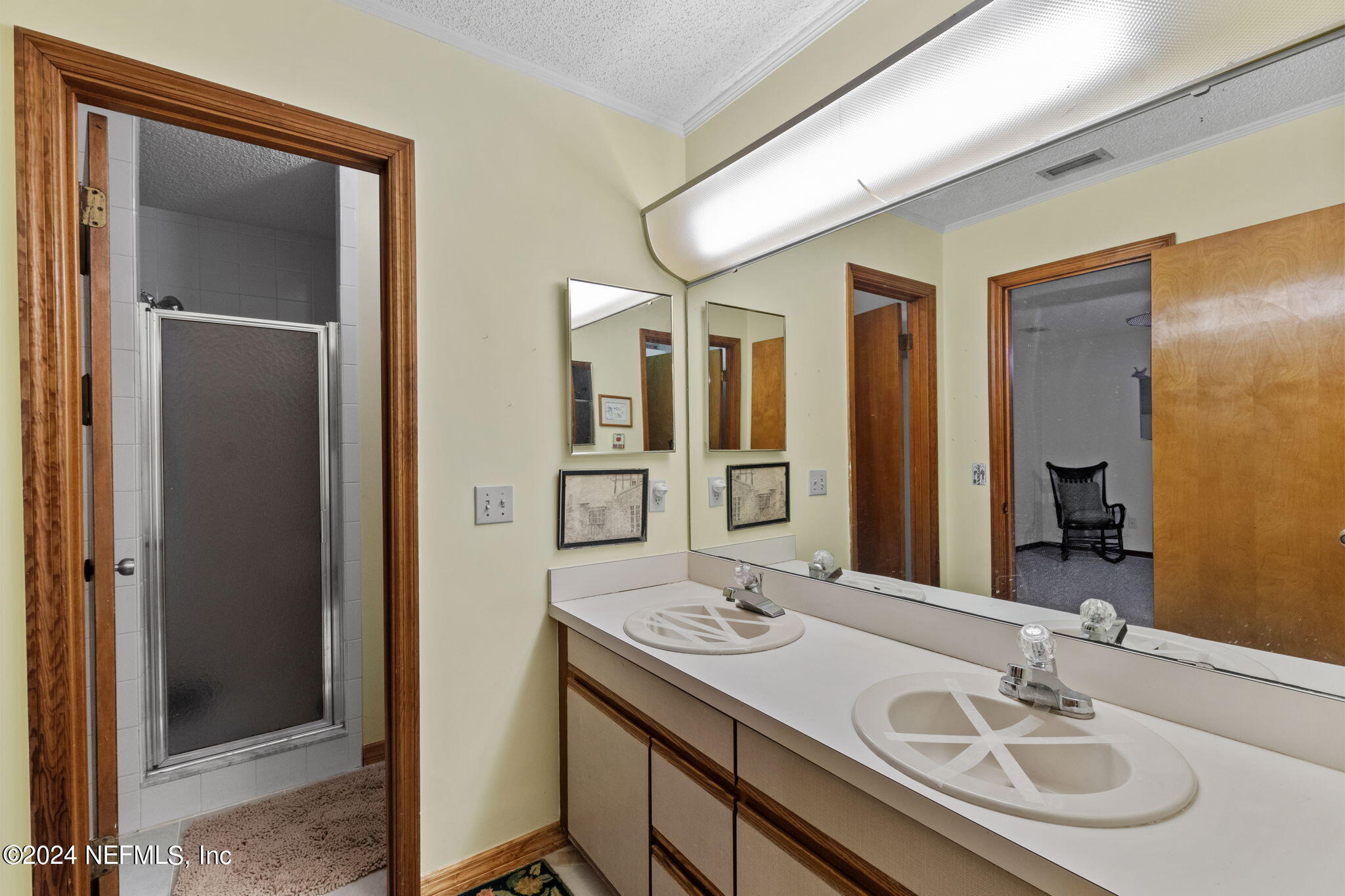 312 Linden Road St. Augustine, FL 32086 - Photo 15 of 40 a bathroom with a sink and a mirror