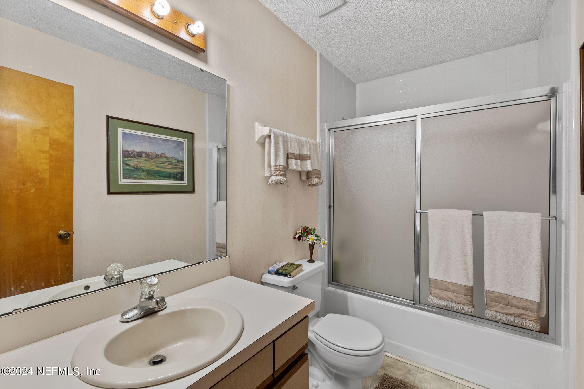 312 Linden Road St. Augustine, FL 32086 - Photo 17 of 40 a bathroom with a sink toilet and shower