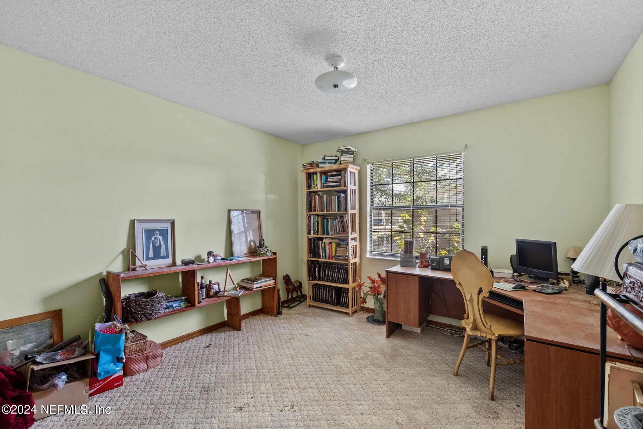 312 Linden Road St. Augustine, FL 32086 - Photo 18 of 40 a view of a workspace with furniture and toys