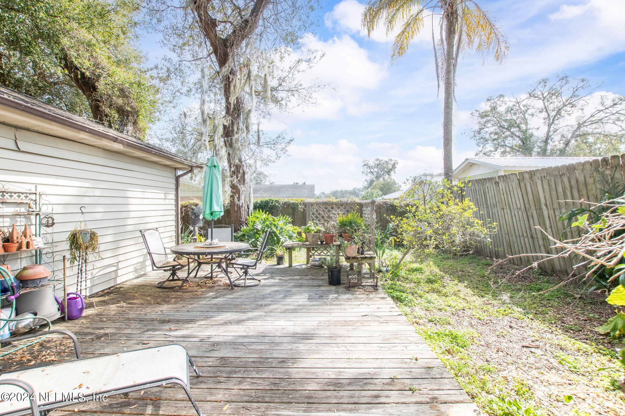 312 Linden Road St. Augustine, FL 32086 - Photo 24 of 40 a view of a backyard with sitting area