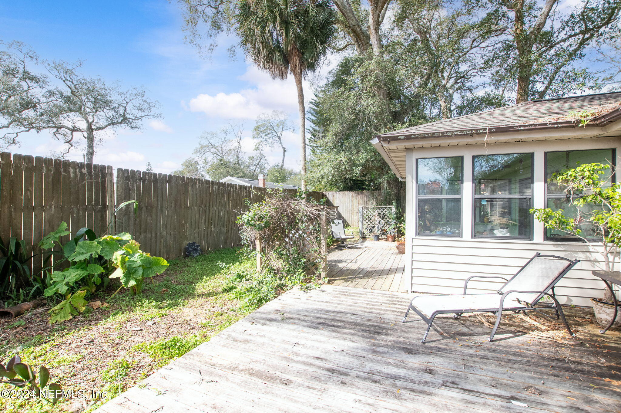 312 Linden Road St. Augustine, FL 32086 - Photo 29 of 40 a view of a house with backyard and sitting area