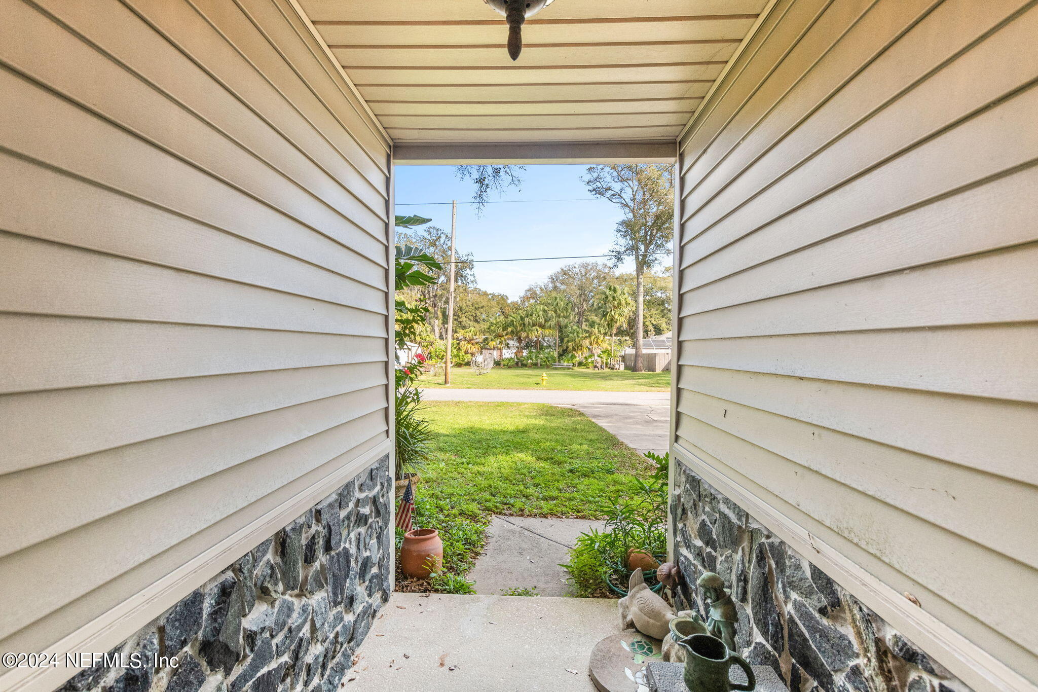 312 Linden Road St. Augustine, FL 32086 - Photo 6 of 40 a view of a porch with seating space