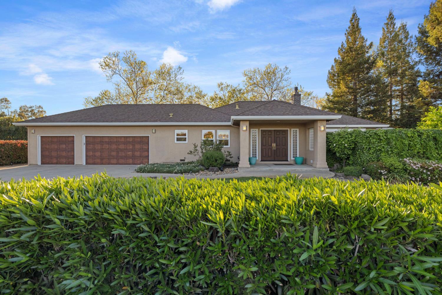 10675 Valensin Road Galt, CA 95632 - Photo 21 of 99 front view of a house with a yard