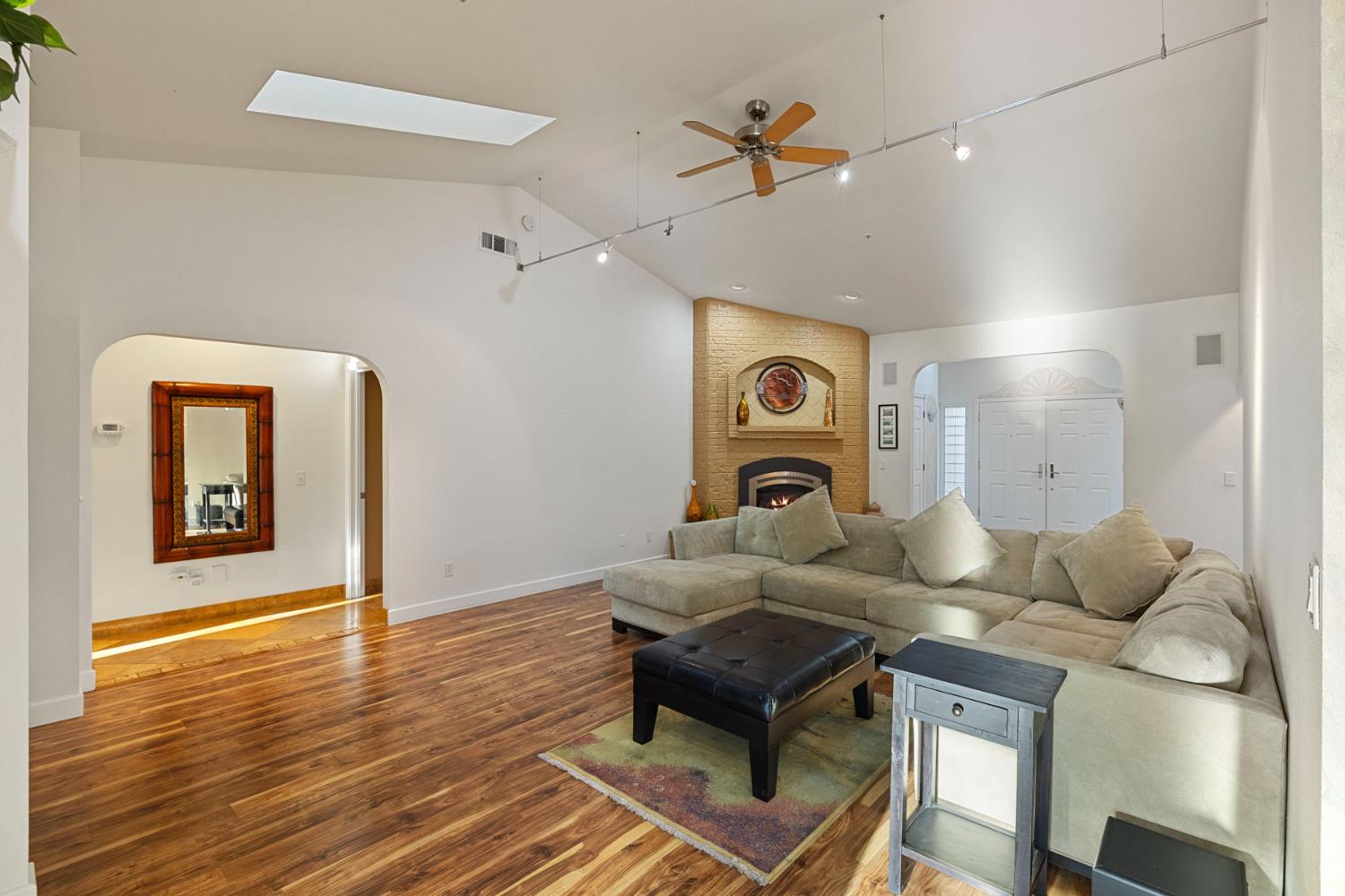 10675 Valensin Road Galt, CA 95632 - Photo 41 of 99 a living room with furniture and a wooden floor