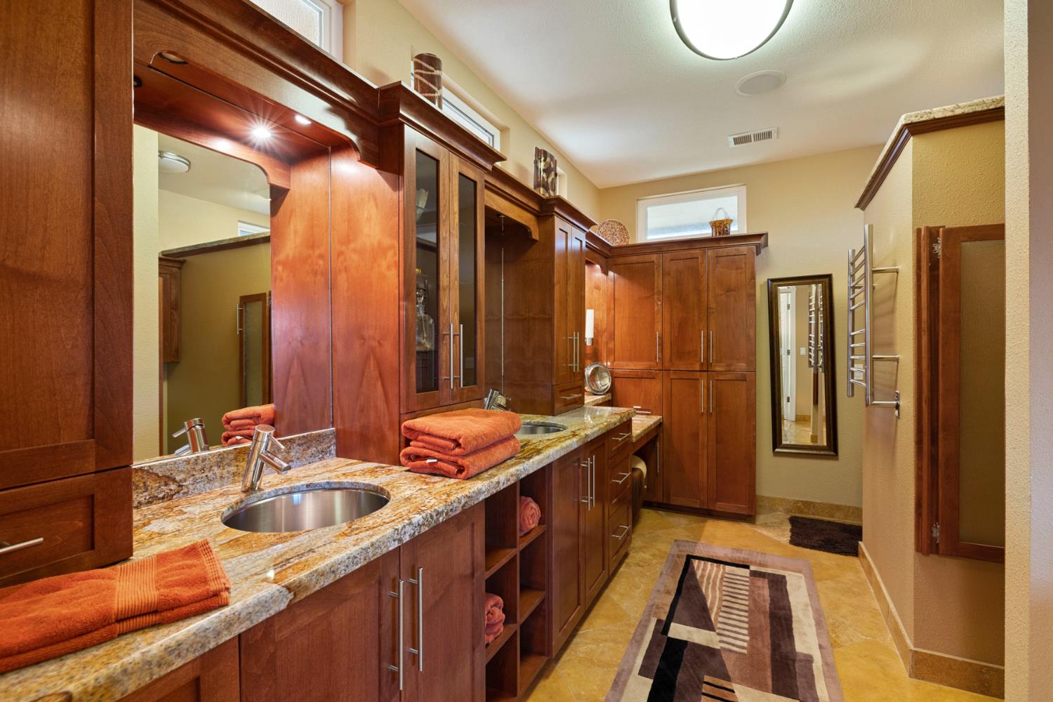 10675 Valensin Road Galt, CA 95632 - Photo 45 of 99 a bathroom with a sink double vanity and a mirror