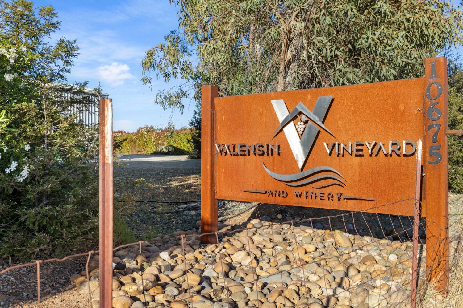 10675 Valensin Road Galt, CA 95632 - Photo 5 of 99 a sign on the side of the road