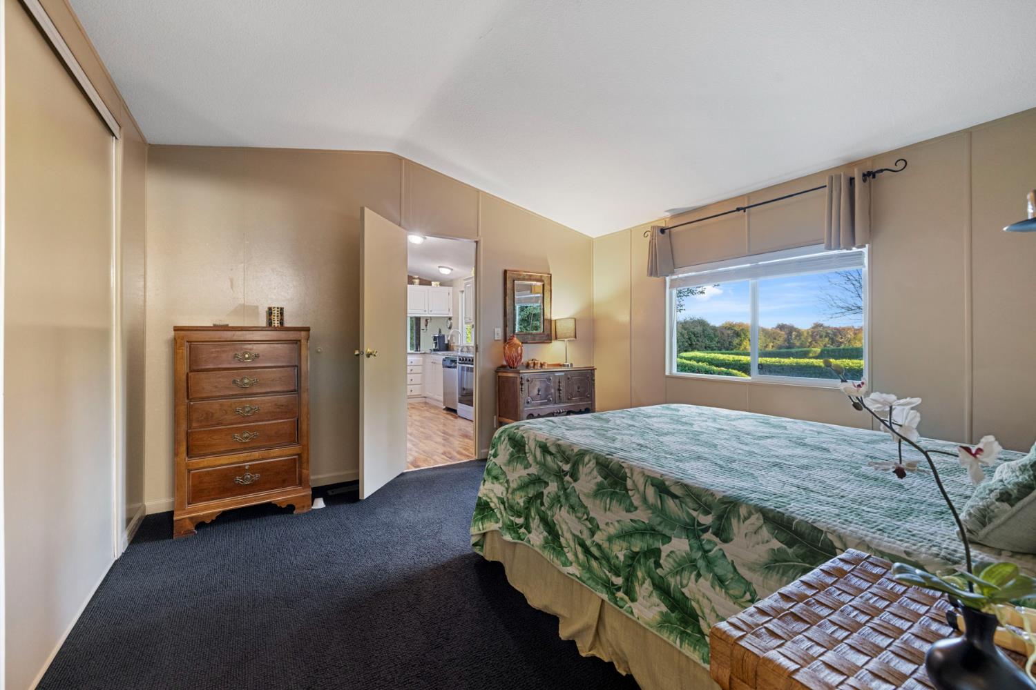 10675 Valensin Road Galt, CA 95632 - Photo 64 of 99 a bedroom with a bed and large windows